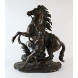 A bronze model of the Marly horse, together with groom, 20th Century, 70cm high