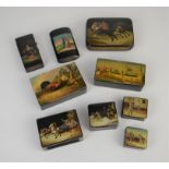 Collection of Russian papier-mache boxes, late 19th Century and later, to include a purse and