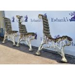 Set of three late 19th century cast iron bench supports with entwined vine design in the manner of