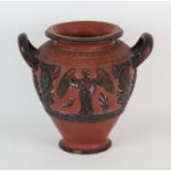 A terracotta and painted vase, in the Grecian taste, 19th Century, with moulded decoration of
