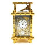 An Aesthetic Movement carriage clock, in the Japanese taste, 19th Century, the pillars and handle