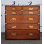 Teak and brass bound military chest, 19th Century, in two sections, with four short drawers,
