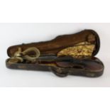 Violin, with lions head carved scroll and portrait medallion to the back, with titling C de S,