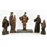 Five continental carved and painted religious figures, to comprise two versions of the Virgin with