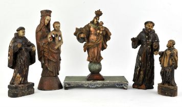 Five continental carved and painted religious figures, to comprise two versions of the Virgin with