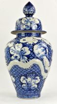 A sometsuke style oviform vase with domed cover and knop finial, decorated on the exterior with