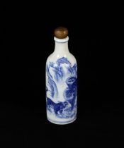 A Chinese blue and white snuff bottle, decorated with a tiger and its cubs, the base with Yongzheng