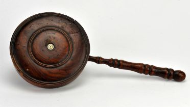 A treen offertory plate holder, probably 18th Century, with turned handle, 39cm long