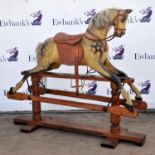 Dapple grey rocking horse, late 19th century, with horse hair main and tail, leather saddle and