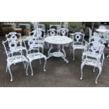 Victorian style pierced aluminium garden table H73 x D91cm and six arm chairs four similar chairs,