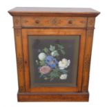 An oak pier cabinet, 19th Century, with frieze drawer above glazed door, decorated with printed and