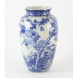 A Japanese sometsuke slender oviform vase decorated with a Bird-of-Prey beside other birds and a