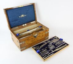 Oak and metal mounted draftsman set by Stanley, with hinged lid, enclosing a lift out tray