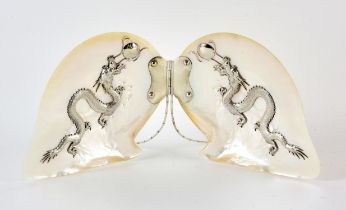 A Large Chinese mother of pearl scallop shell table ornament mounted with two dragons chasing