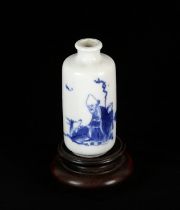 A blue and white Chinese snuff bottle of cylindrical form decorated with the Daoist theme of