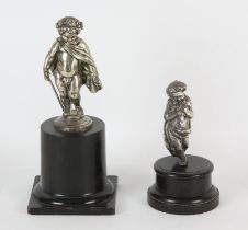 A silver plate brass figure of a putto, late 19th/early 20th Century, modelled standing wrapped in