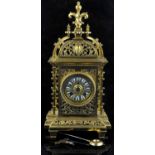 French brass mantel clock, late 19th Century, the case of pierced architectural design,