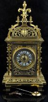 French brass mantel clock, late 19th Century, the case of pierced architectural design,