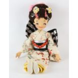 A Lenci type doll, in the form of a Geisha girl, with jointed body, wearing a kimono, 59cm high
