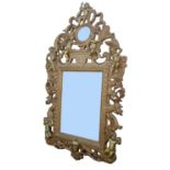 Gilt wood mirror in the baroque taste, 20th Century with pierced cresting and scrollwork borders