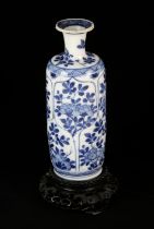 A small Chinese blue and white vase decorated with floral designs, 14cm high, Kangxi; with an
