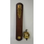 Thwaites and Reed brass gravity clock, with mahogany wall mount, no 390, engraved to base name