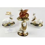 Four Royal Crown Derby paperweights, three from the Heraldic Beasts series, designed by Louise