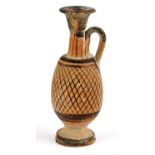 South Italian pottery `net’ lekythos, circa 4th Century BC, 12 cm high Provenance: These items were