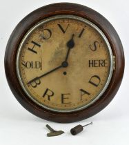 Victorian oak circular wall clock, the face applied with the advertising letters HOVIS BREAD sold