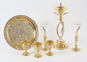 Russian gilt metal and jewelled candlestick and snuffer, 20th Century, set with semi-precious