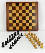 Boxwood and ebonised Staunton pattern chess set, folding games board with backgammon,