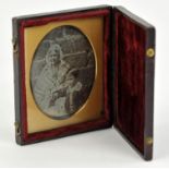 Oval framed daguerreotype showing a woman and child, enclosed note naming the sitter,