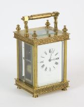 French brass carriage clock, 19th Century, the case with four finials, with grilled decoration in