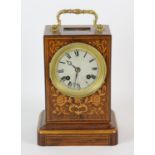 Rosewood and florally inlaid mantel clock, 19th Century, with a gilt metal engine turned bezel,