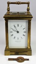 A brass repeating carriage clock, late 19th Century, retailed by Marshall and Sons,