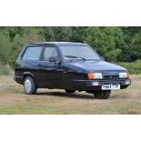 1997 Reliant Robin LX. Registration number: R844 TTP. Mileage: 33,231. Finished in deep blue.