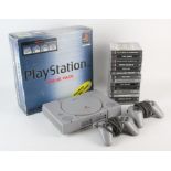 PlayStation 1 Value Pack boxed console with 14 games + original Demo1 disc Includes: Demo1,