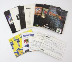 An assortment of Nintendo 64 manuals and instruction booklets
