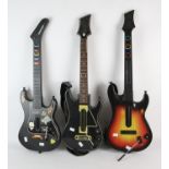Assortment of Guitar Hero peripherals. Includes: Kramer Guitar Controller, Guitar Hero World Tour