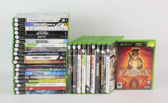 An assortment of 29 Xbox games (PAL) Highlights include: Fable, Jade Empire, Timesplitters 2 (x3),