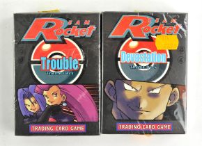 Pokemon TCG. Two Team Rocket Theme Decks, Devastation and Trouble, both sealed. Boxes are in