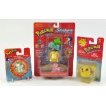 An assortment of small Pokémon toys and figures Includes: Pikachu Pull Back, Mewtwo Power Bouncer