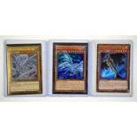 Yu-Gi-Oh! Lot of three Yu-Gi-Oh cards including Blue-Eyes White Dragon Gold Secret Rare from The