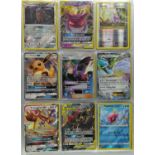 Pokemon TCG. A binder of Pokémon cards from mixed sets including popular tag team cards Gengar and
