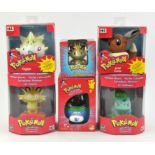 An assortment of Pokémon toys & merchandise Includes: Meowth Decorative Ornament,