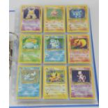 Pokemon TCG. Large binder of approximately 300-400 cards from the early wizards of the coast era