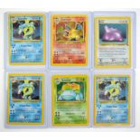 Pokemon TCG. Lot of mostly base set Pokémon cards including 9 holographic cards with the popular