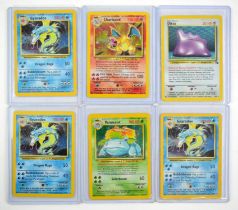 Pokemon TCG. Lot of mostly base set Pokémon cards including 9 holographic cards with the popular