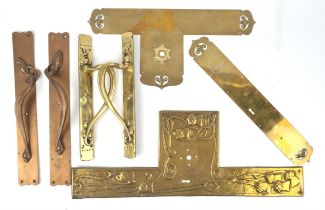Pair of brass Art Nouveau door handles, 37 x 4cm, together with a larger pair, with coppered