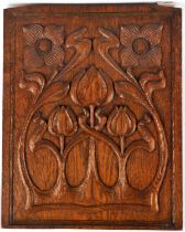 Oak panel,late 19th Century, carved with stylised flowers and leaves, 55 x 45.7cm